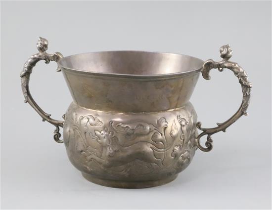 A large 19th century 17th century style two handled silver porringer 17.5 oz.